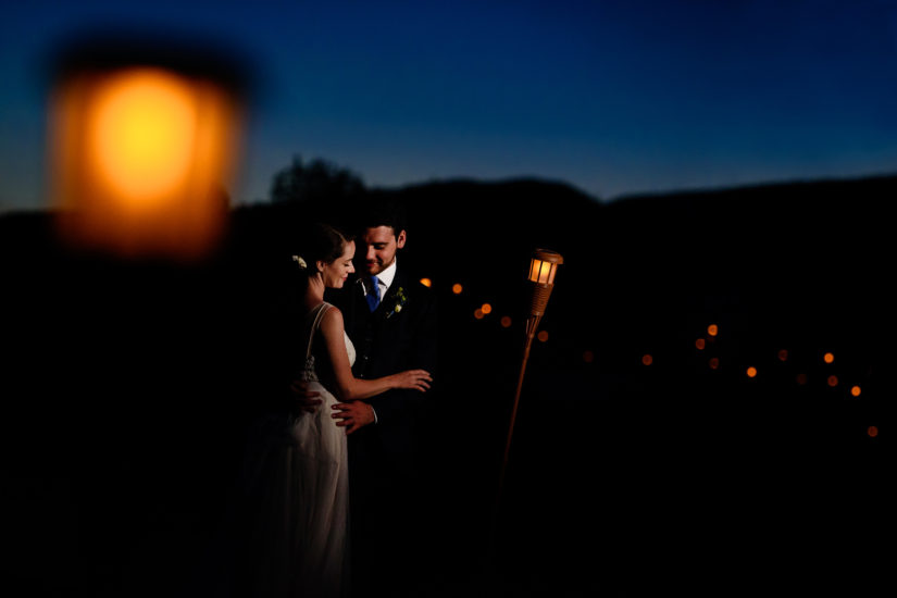 Stowe wedding;Trapp Family Lodge Wedding;Vermont wedding photographers;dusk wedding photo;tiki torches wedding